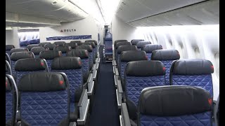 Delta 777 cabin tour 7CB 4k [upl. by Ruenhcs]