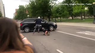 RAW Graphic video shows protester run over in Denver [upl. by Noiztneb70]