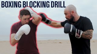 How To Block A Punch  Defensive Blocking Drill [upl. by Stefano934]